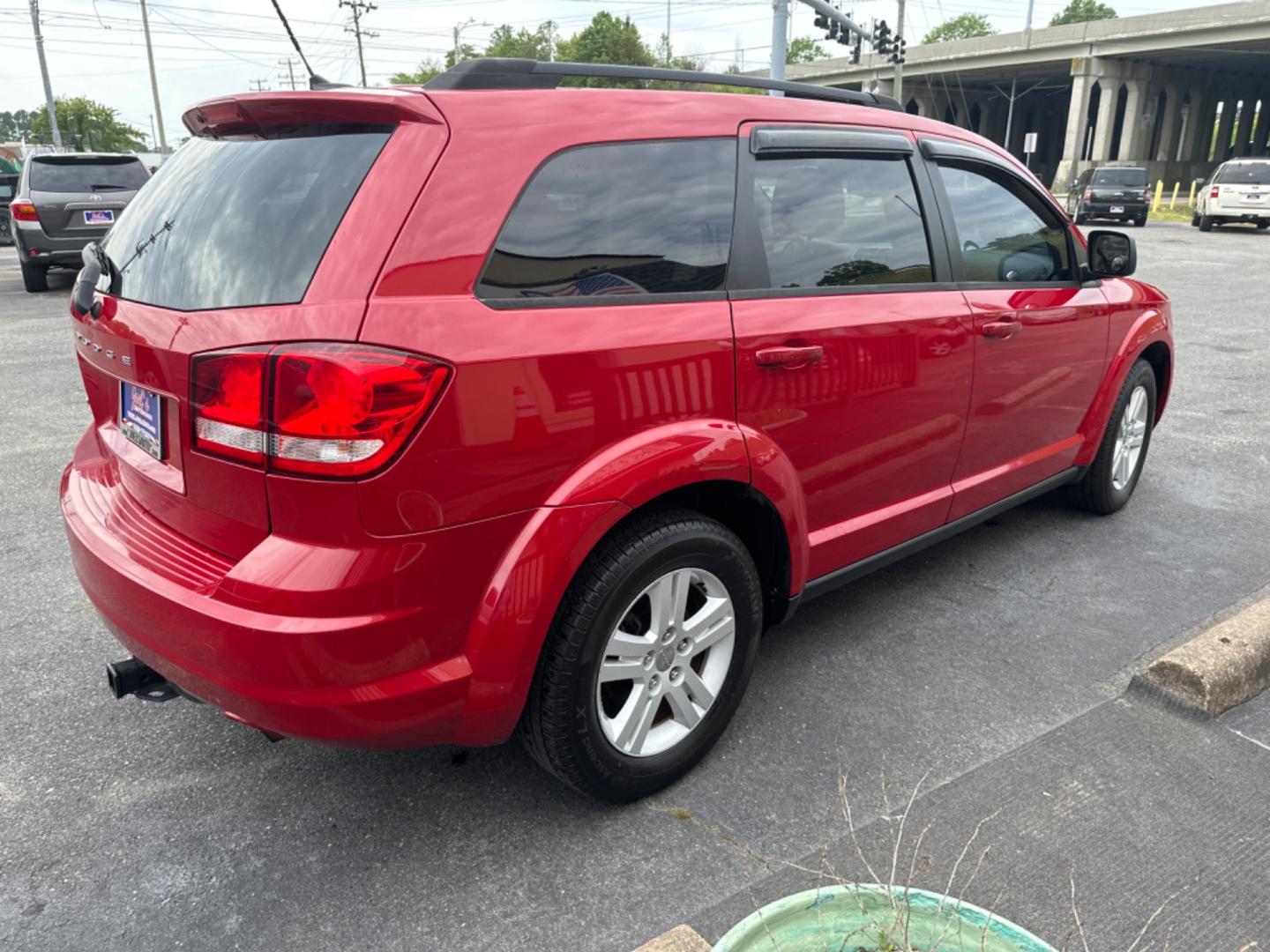 2012 Red /black Dodge Journey SE (3C4PDCAB8CT) with an 2.4L L4 DOHC 16V engine, 4-Speed Automatic transmission, located at 5700 Curlew Drive, Norfolk, VA, 23502, (757) 455-6330, 36.841885, -76.209412 - Photo#3